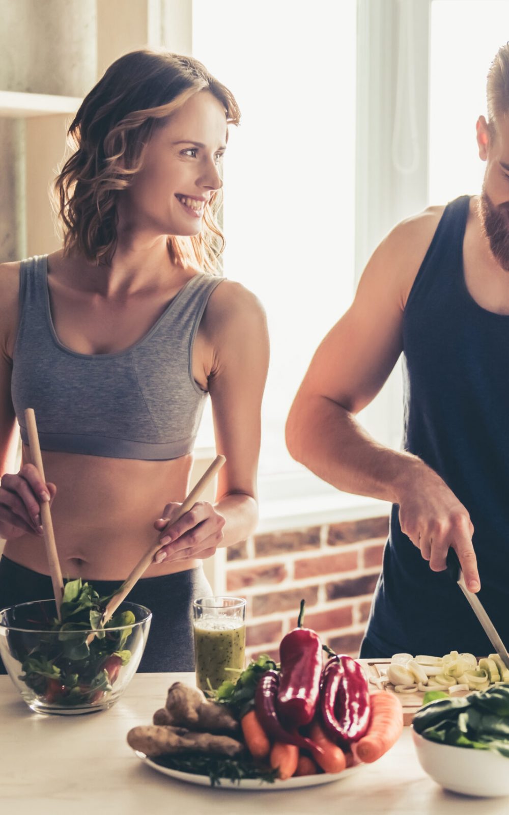 Beautiful,Young,Sports,People,Are,Talking,And,Smiling,While,Cooking Beautiful,Young,Sports,People,Are,Talking,And,Smiling,While,Cooking